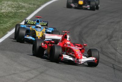 Michael Schumacher leads Fernando Alonso at the 2006 San Marino GP