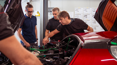 Alfa Romeo techs work on the 33 Stradale