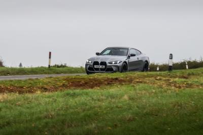 BMW M4 - front, driving