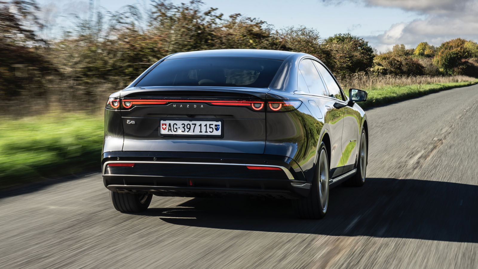 Mazda 6e - rear, driving