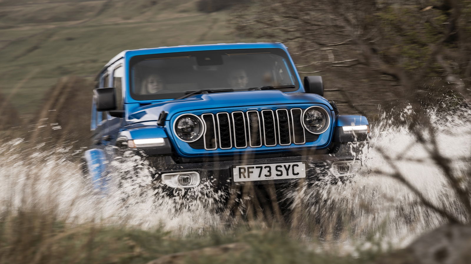 Jeep Wrangler - front, driving
