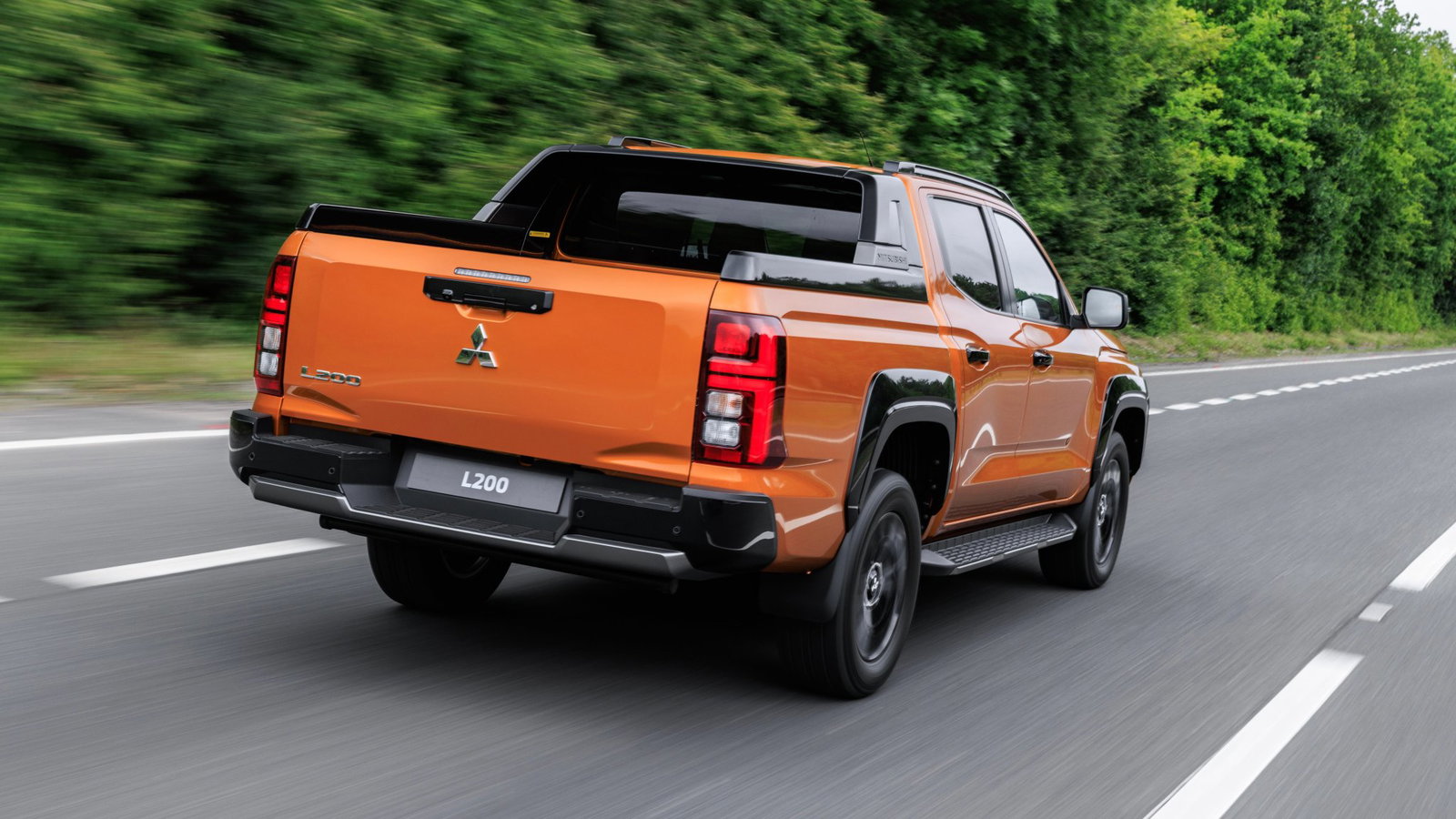 2026 Mitsubishi L200 - rear, driving